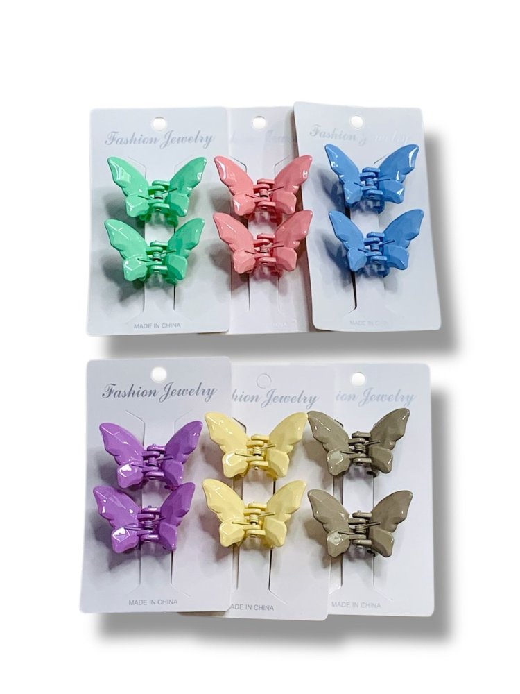 pinza gancho mariposa de colores de tres unidades -----