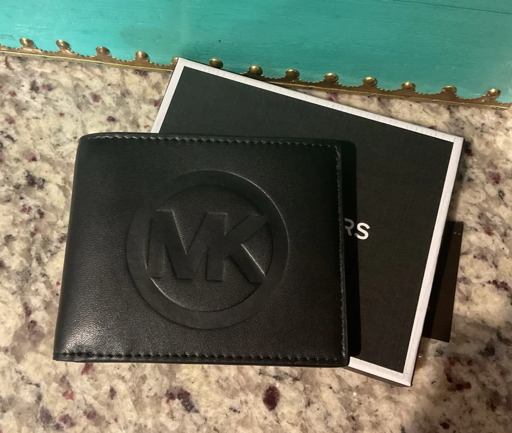 Cartera negra MK hom