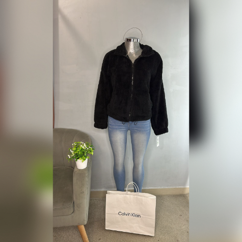 Chamarra de peluche negra CK Talla L Muj