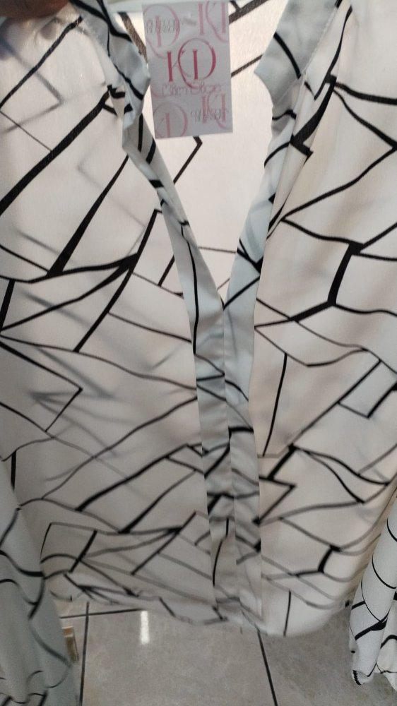 BLUSA  DE RAYAS NEGRAS