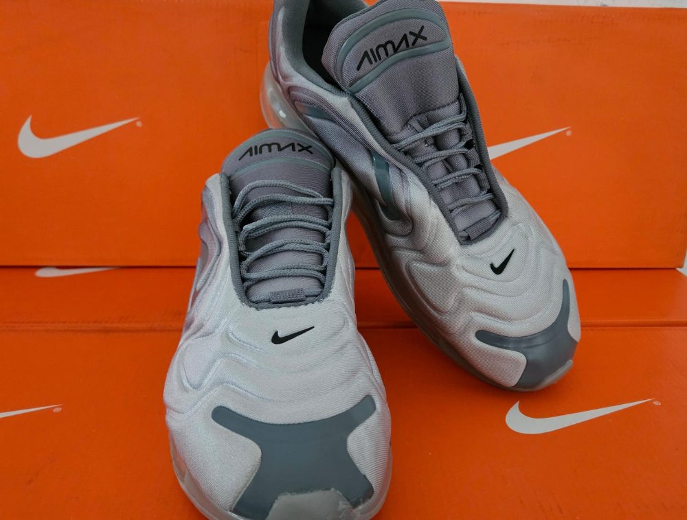 NIKE TORTUGO PLATA #7.5