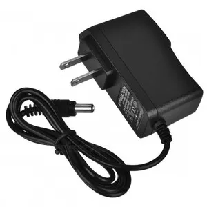A. Central Cargador Normal Para Camara 12V 1A