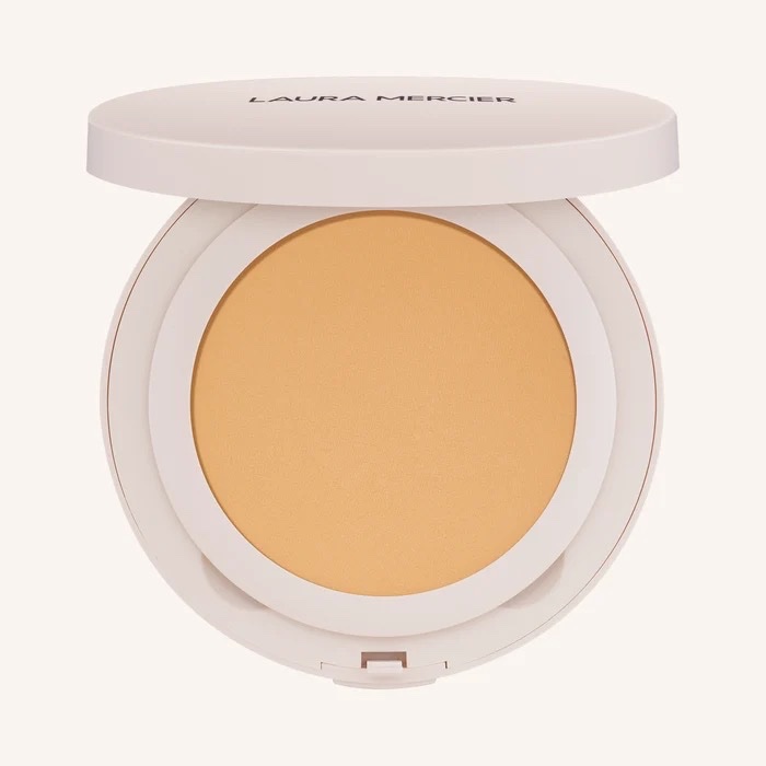 LAURA MERCIER Polvos fijadores compactos, translúcidos, resistentes al agua y sin talco, con efecto ultra-difuminador.