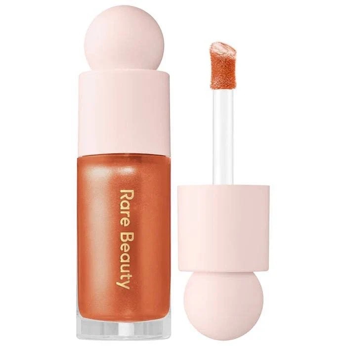 RARE BEAUTY  Positive light liquid luminizer