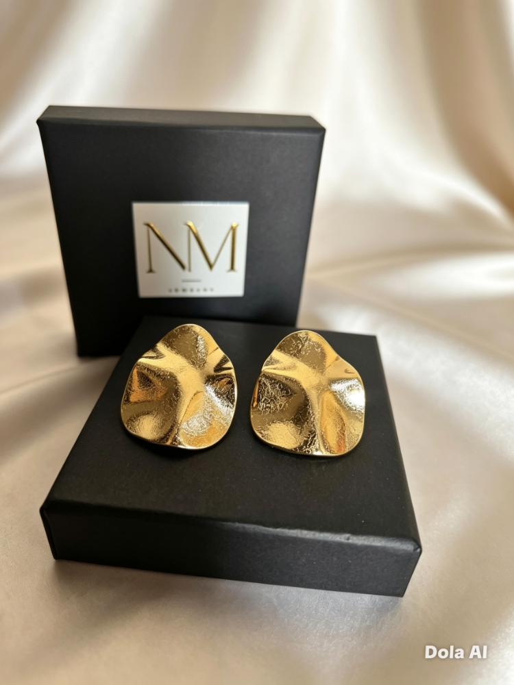 Aretes esculturales
