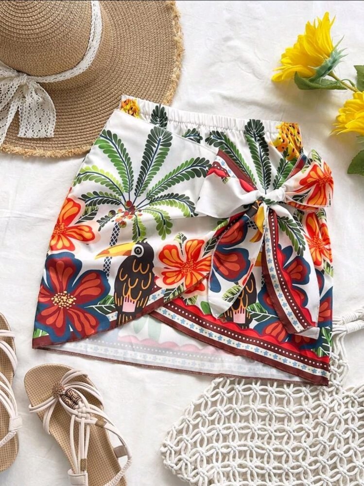 FALDA SHORT - ESTAMPADO LOROS FLORES ROSAS
