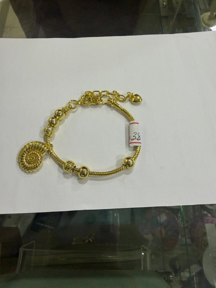 PULSERA DORADA CARACOL