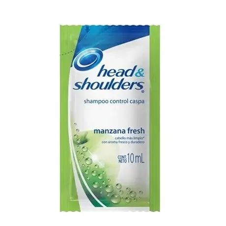 shampoo head y shoulders sobre manzana verde