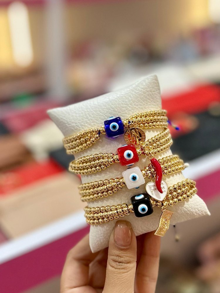 pulseras de ojo turco con triple balin y dos dijes