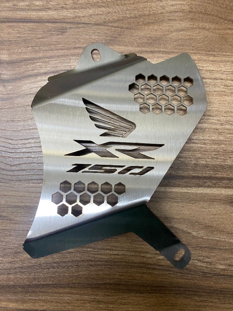 TAPA PIÑON XR150 - PERFORADO