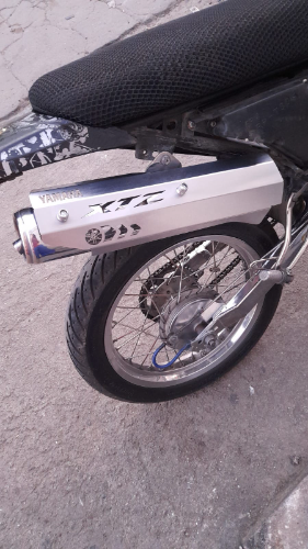 EXOSTO XTZ125 - PERFORADO