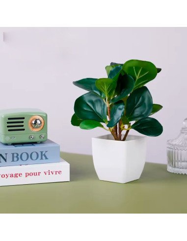 Planta artificial decorativa con maceta