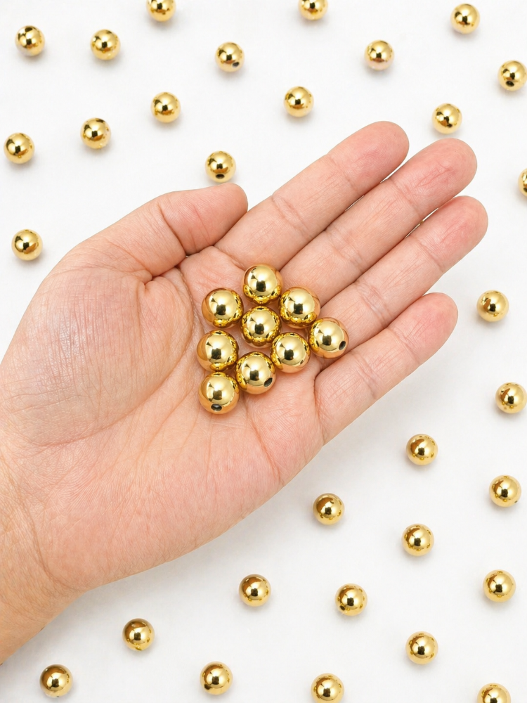 Cuentas acrílico 10mm dorado 10und