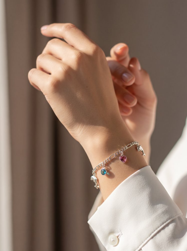 Pulsera de delfines con sircones rosa y azul