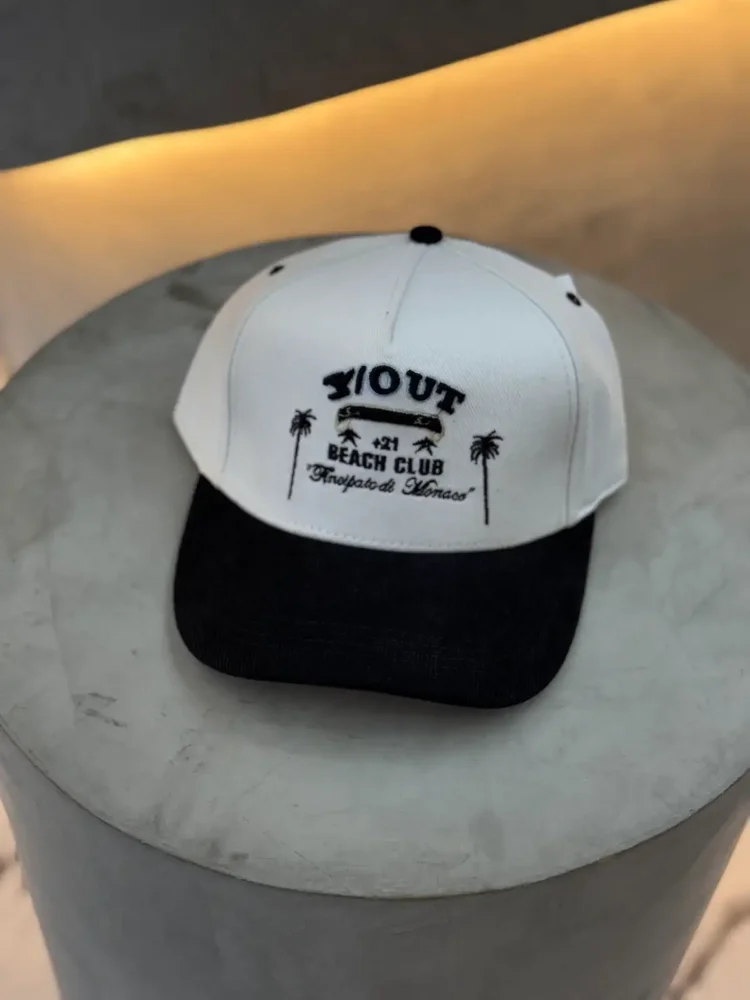 GORRA 1.1 Y/OUT | 02