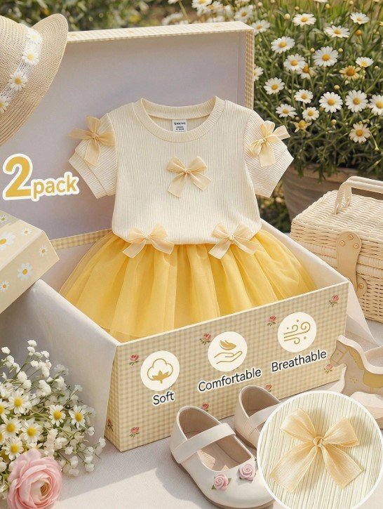 Vestido lazos dorado bebe