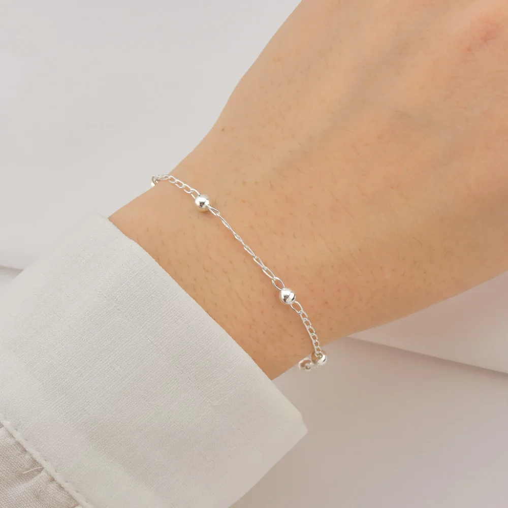 Pulseira de Prata Elo Cartier Ponto de Luz Coração Vermelho