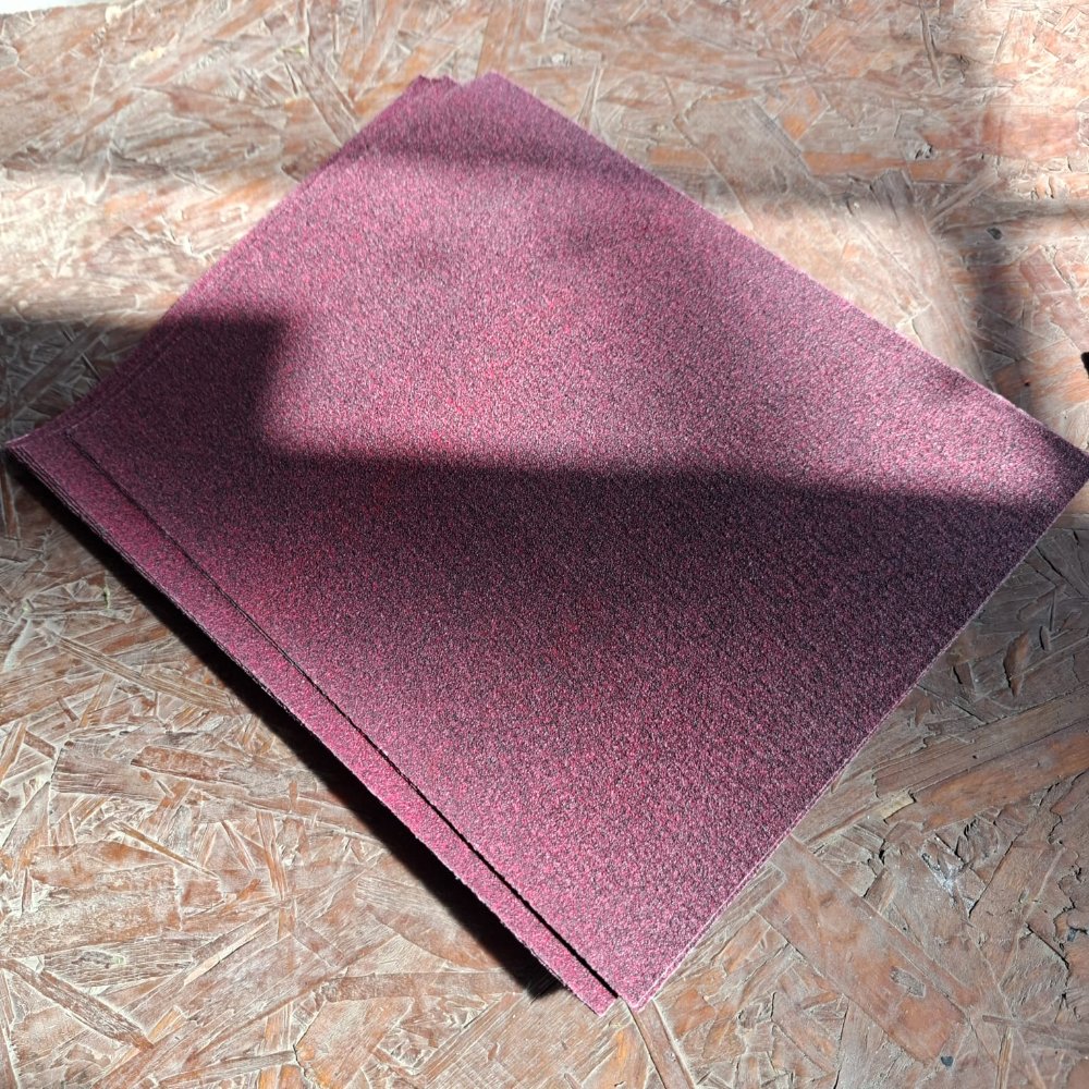 Hoja de lija de la marca Hunter Grano grueso de 50/60 , específicamente el modelo Multiuso EBX-51 para lijado en seco