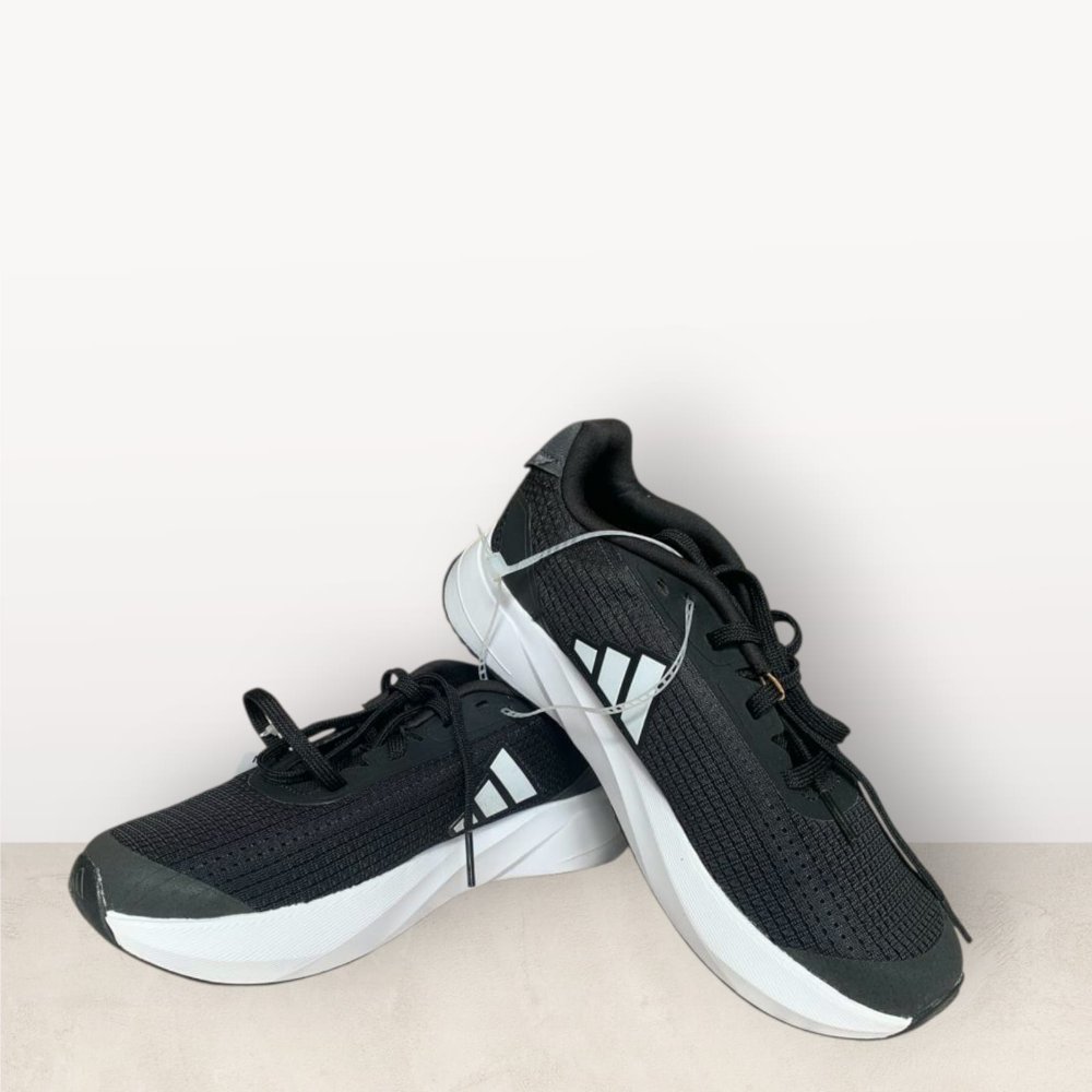 ADIDAS tenis deportivos T/US4 negro, suela ancha con logo Adidas al lado