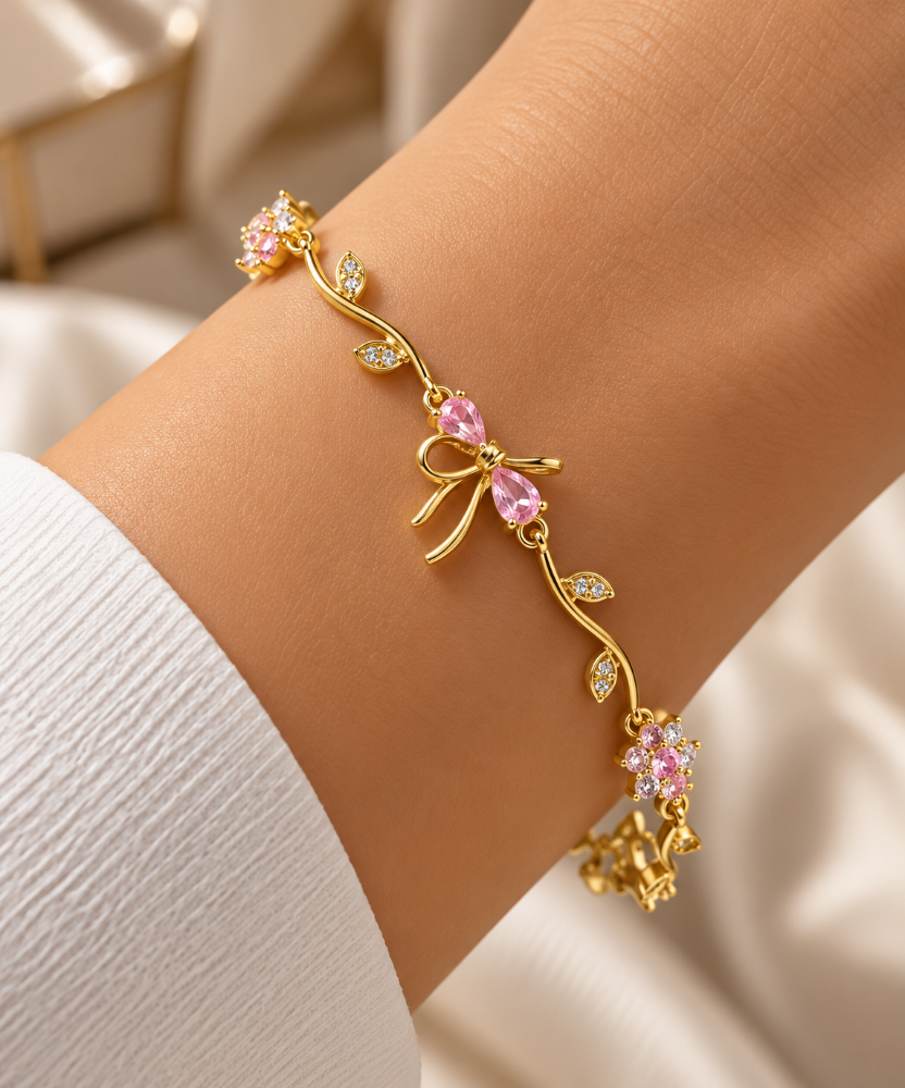 Pulsera dorado/rosa flor lazo