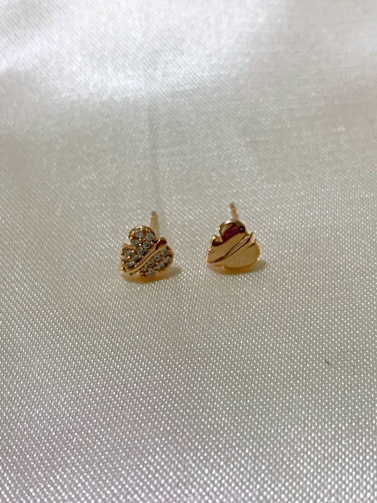 ARETES PEGADOS XUPING HOJITAS ASIMETRICAS