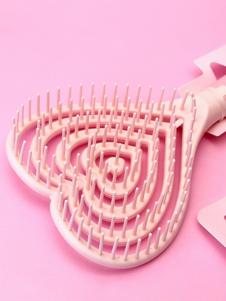 cepillo de corazon rosa