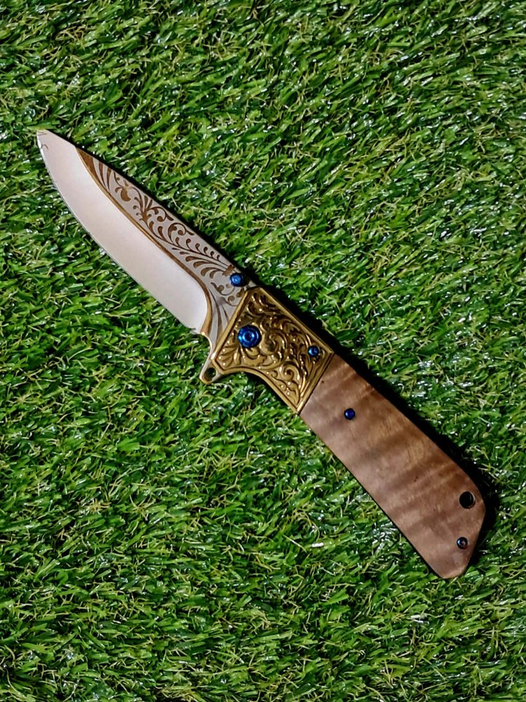 Canivete flip dourado