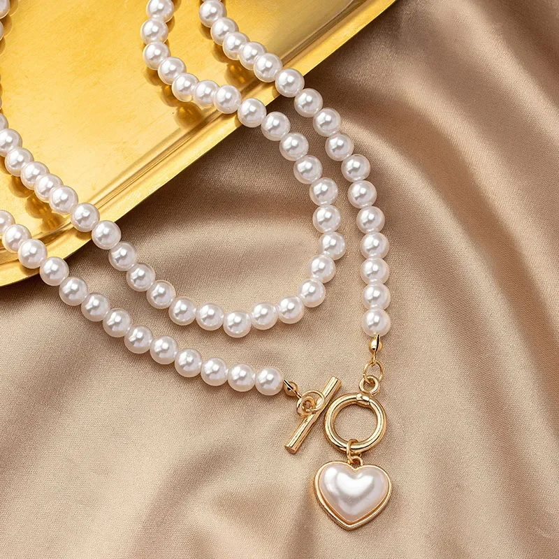 CH 111 - COLLAR COLGANTE ELEGANTE PARA MUJER CON CADENA PERLA EN FORMA DE CORAZÓN Y CUENTAS DE PERLA ARTIFICIAL