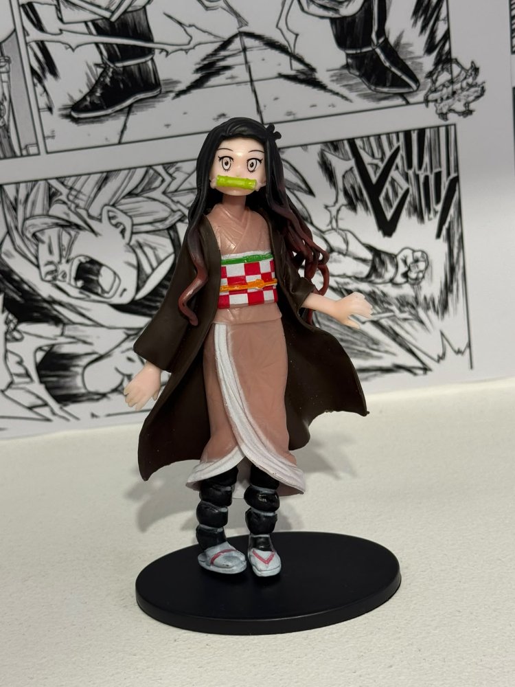 Figuras de Nezuko y Inosuke