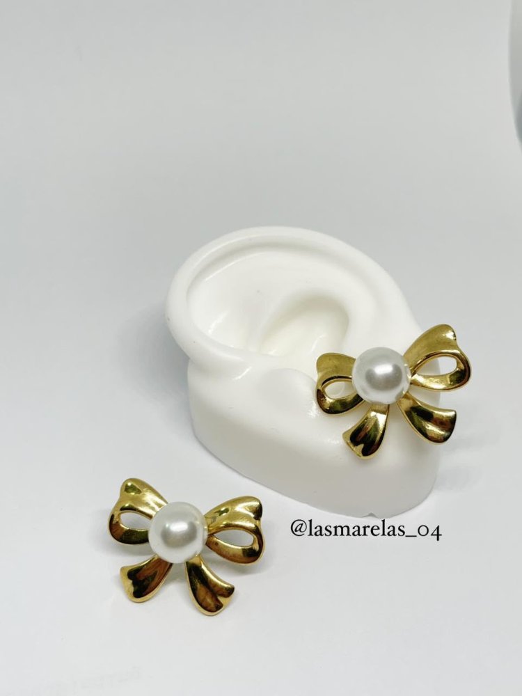Aritos de perla blanca moño - Acero Inoxidable
