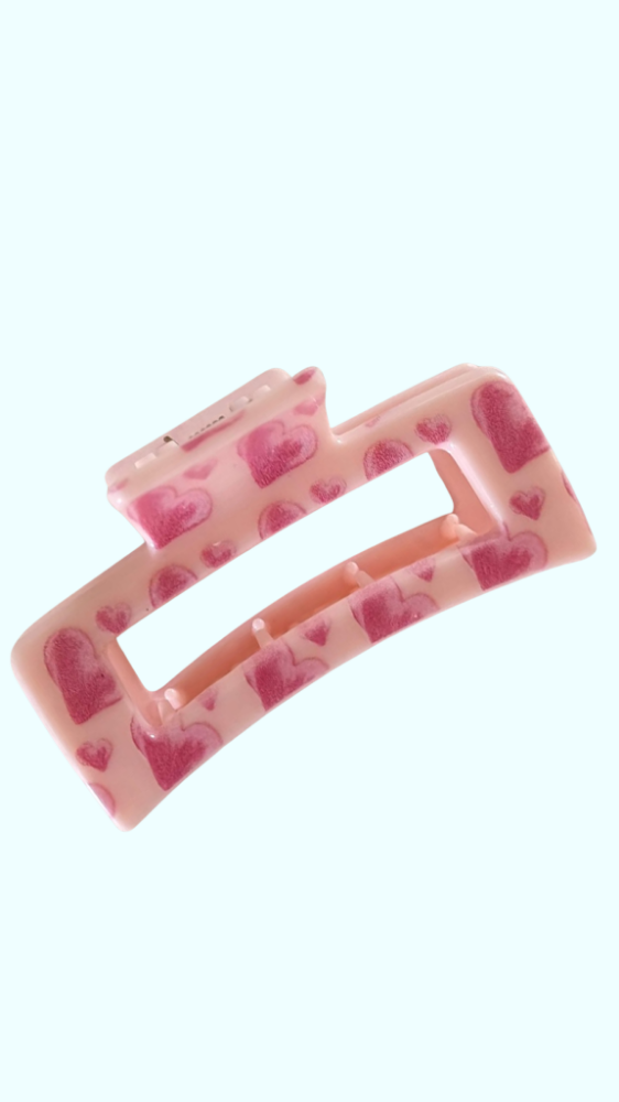 Pinza rosa corazones
