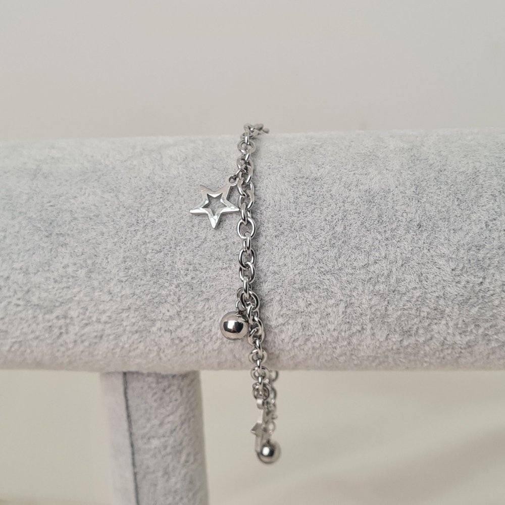 Pulsera Tiffany con bolitas y dijes- estrellas caladas