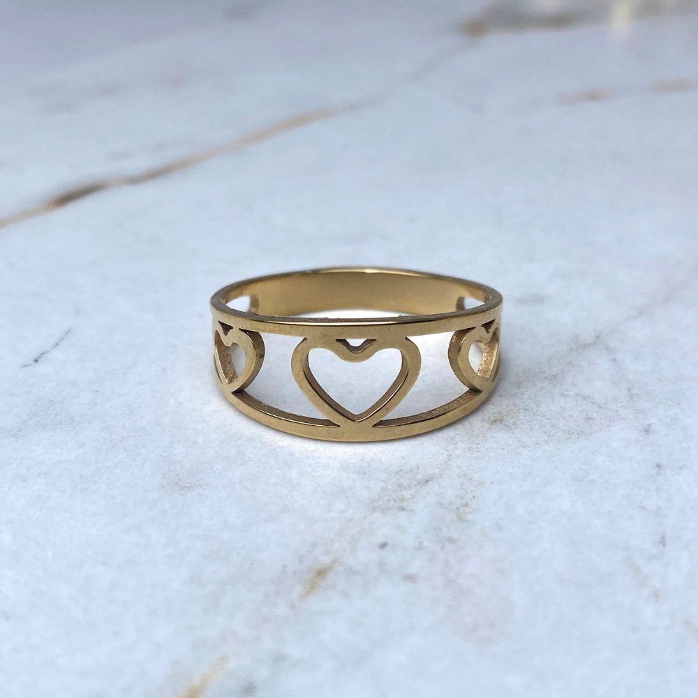 Anillo acero dorado doble línea corazones calados