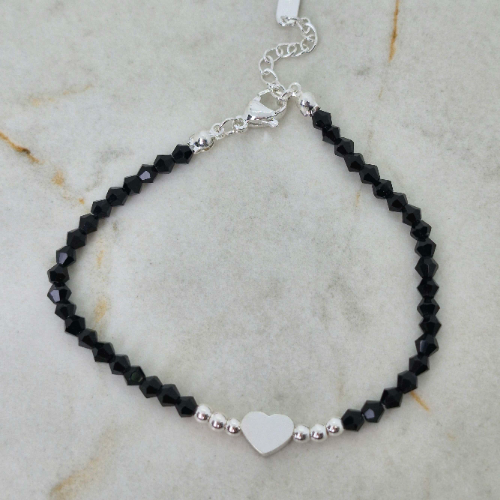 PULSERA ACERO BLANCO CON BOLITAS Y CORAZON - CRISTALES NEGROS