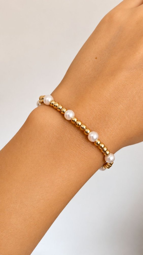 Pulsera dorada perlitas y balines - 1273