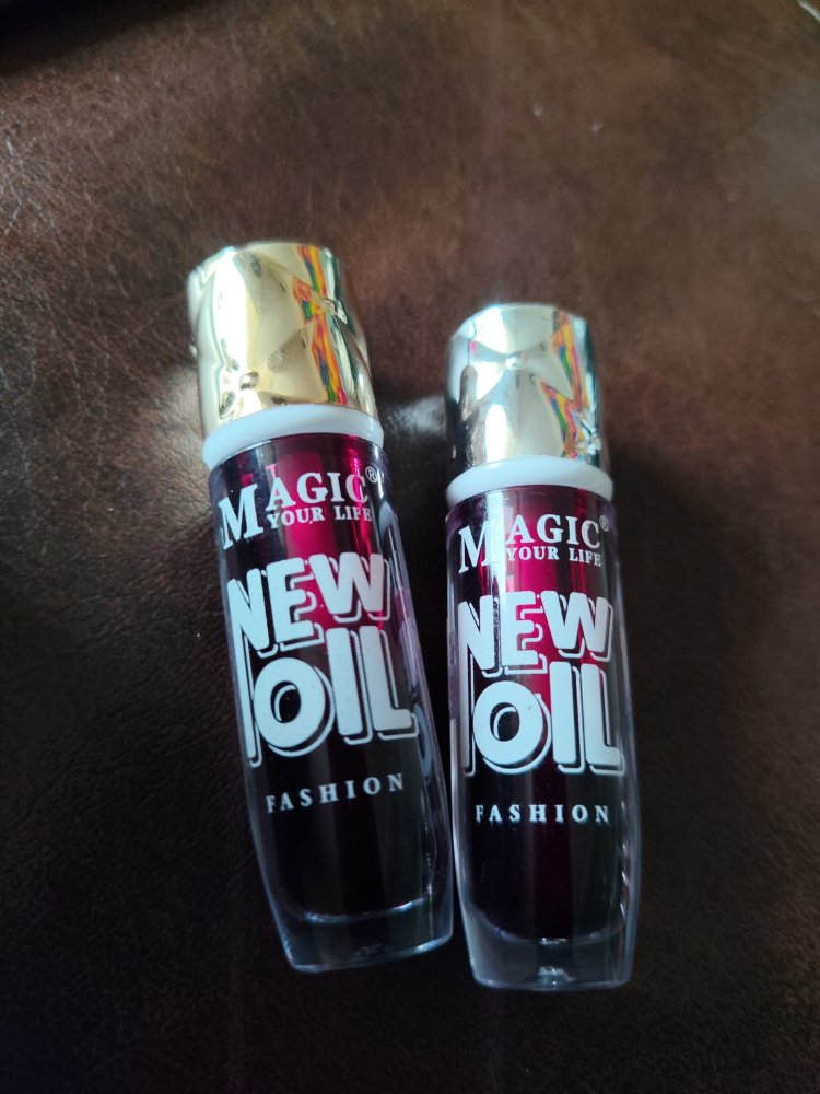 Tinta p/labios tapa dorada/rosa Magic New Oil
