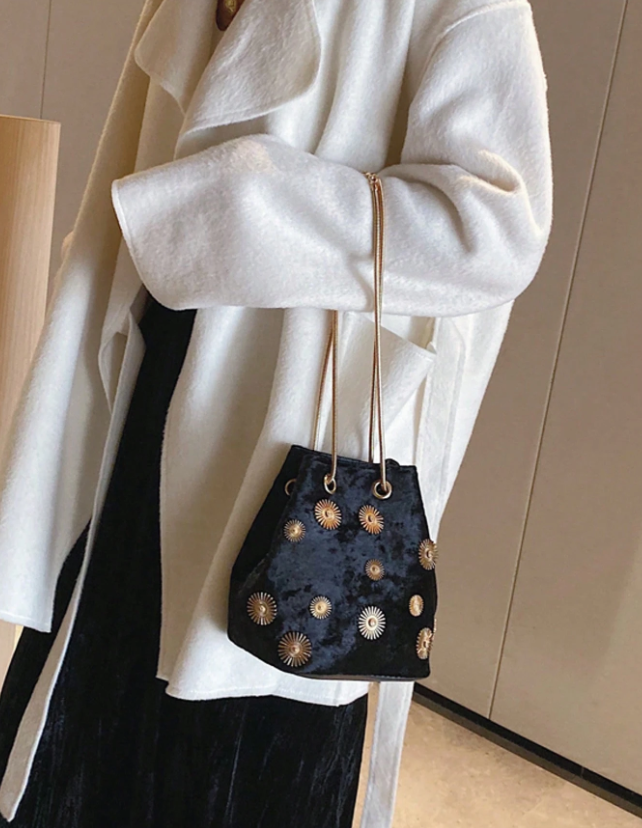 Mini bolso azul marino con soles