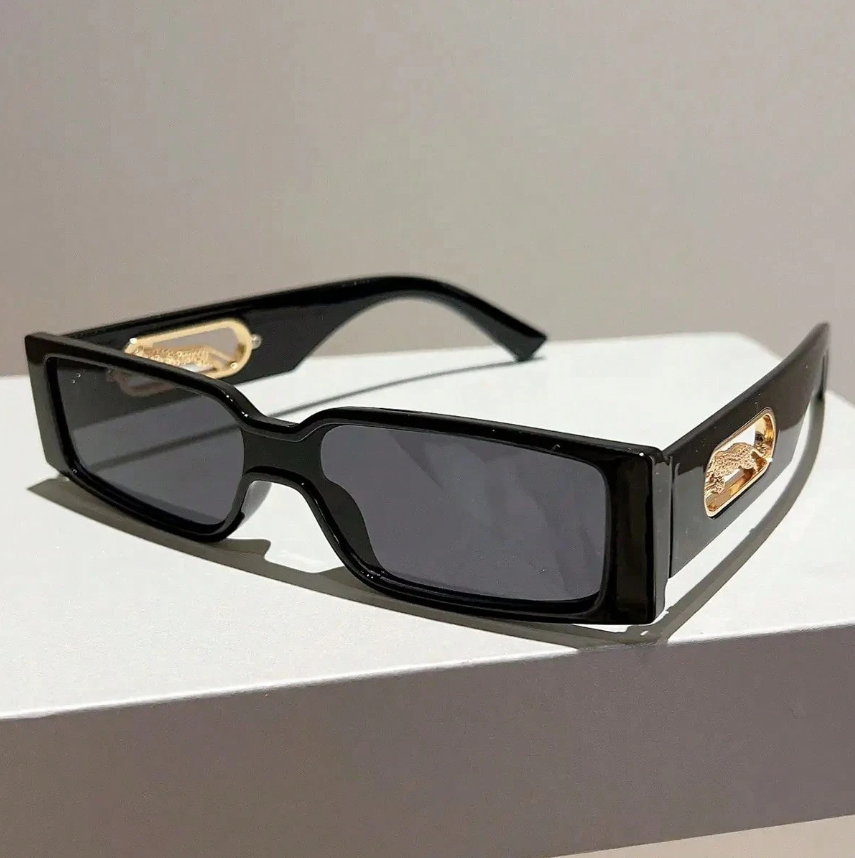 Lentes Wild Noir negros con detalles dorados y leopardo