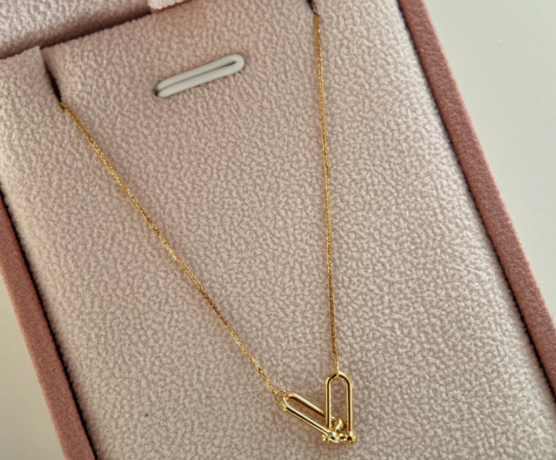 CADENA MINI FRANCO 0.6MM + DIJE HERRAJE ORO AMARILLO ITALY ESP 18K 45CM - 0,81GR