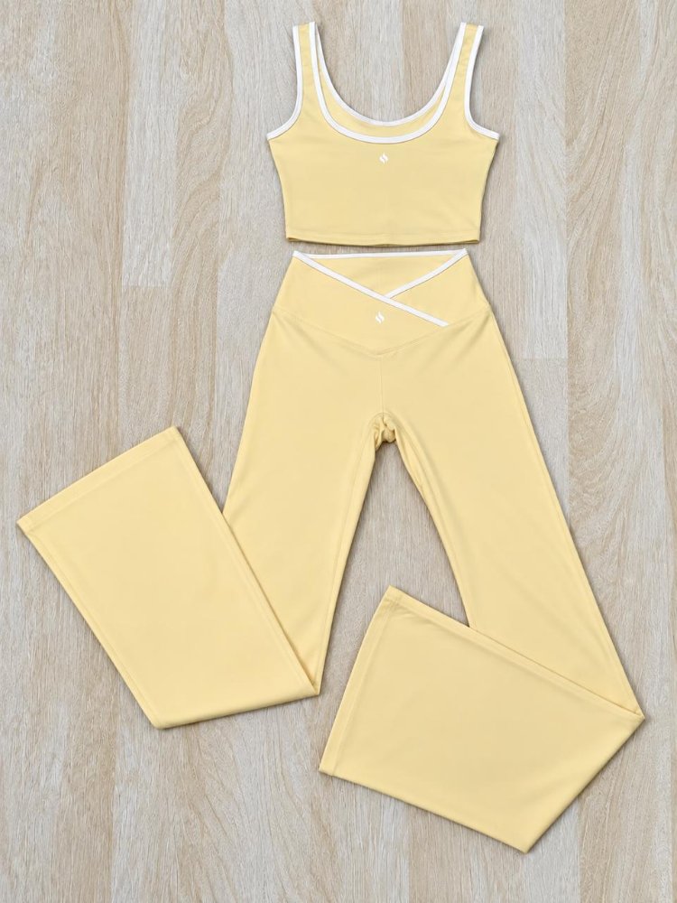 Conjunto deportivo bota campana - amarillo pastel