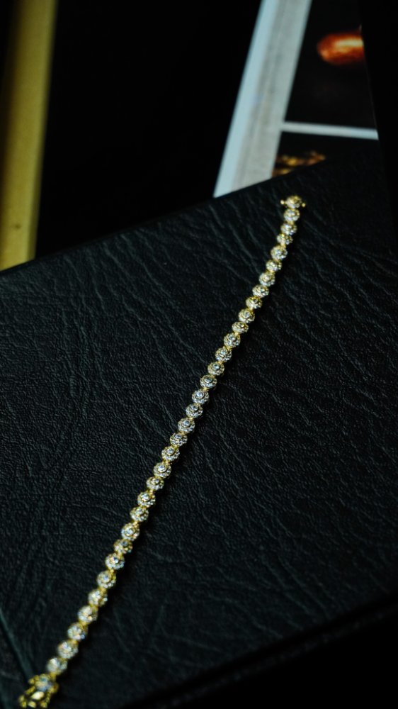 Tennis en Oro 18K
