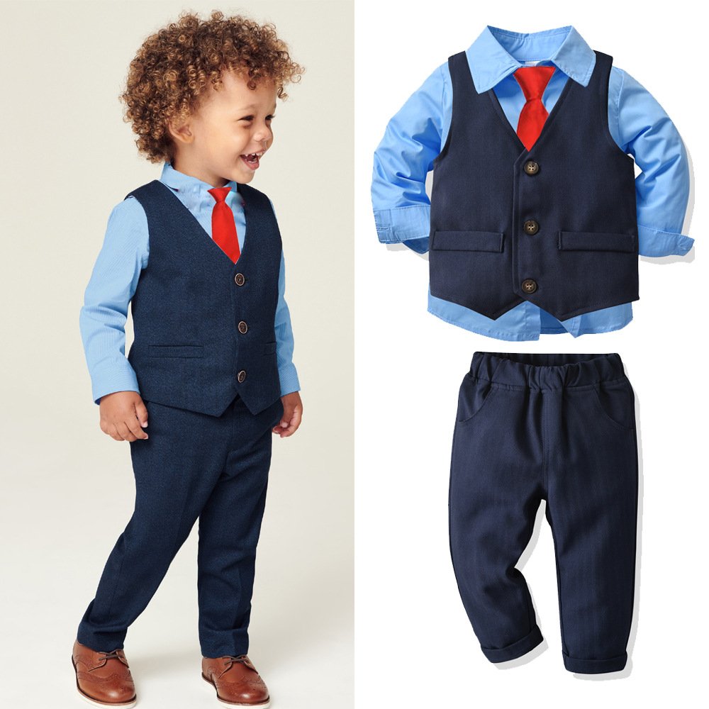 Traje de niño, traje de pantalón y chaleco azul, camisa celeste y corbata roja