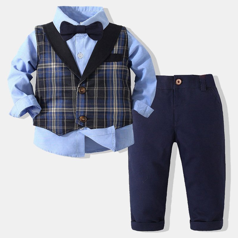 Traje de niño, traje de pantalón azul y chaleco cuadrado en azul, camisa celeste y corbatín negro