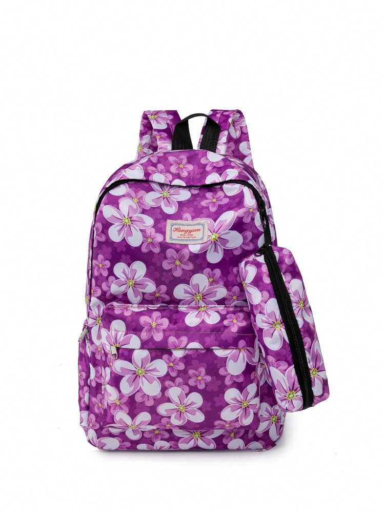 Mochila morada con figuras de flores. Incluye porta lapicero