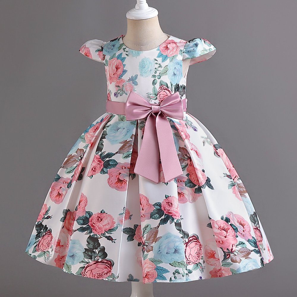 Vestido de niña, vestido blanco con estampado rosado y celeste, mangas cortas, lazo rosado en la cintura