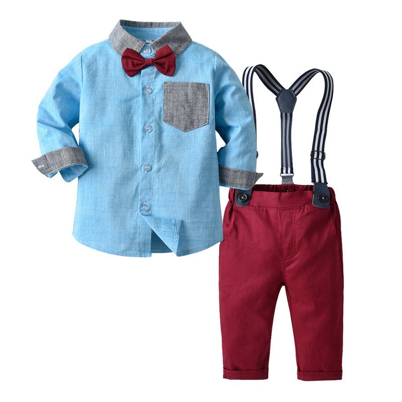 Traje de niño, traje de pantalón rojo, camisa celeste manga larga y detalles (bolsa y puño en gris), tirante rayado y corbatín rojo