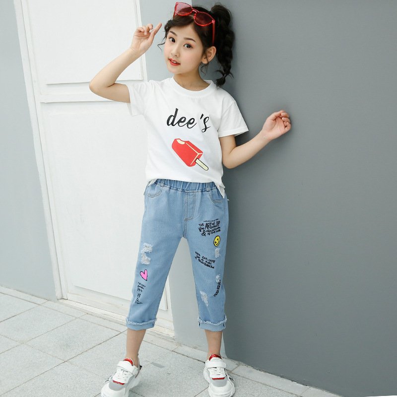 Traje de niña, traje de pantalón jeans con dibujos y letras, camiseta blanca con dibujo de paleta