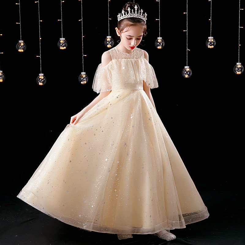 Vestido de niña vestido crema con detalles de estrellas, vuelo en los hombros