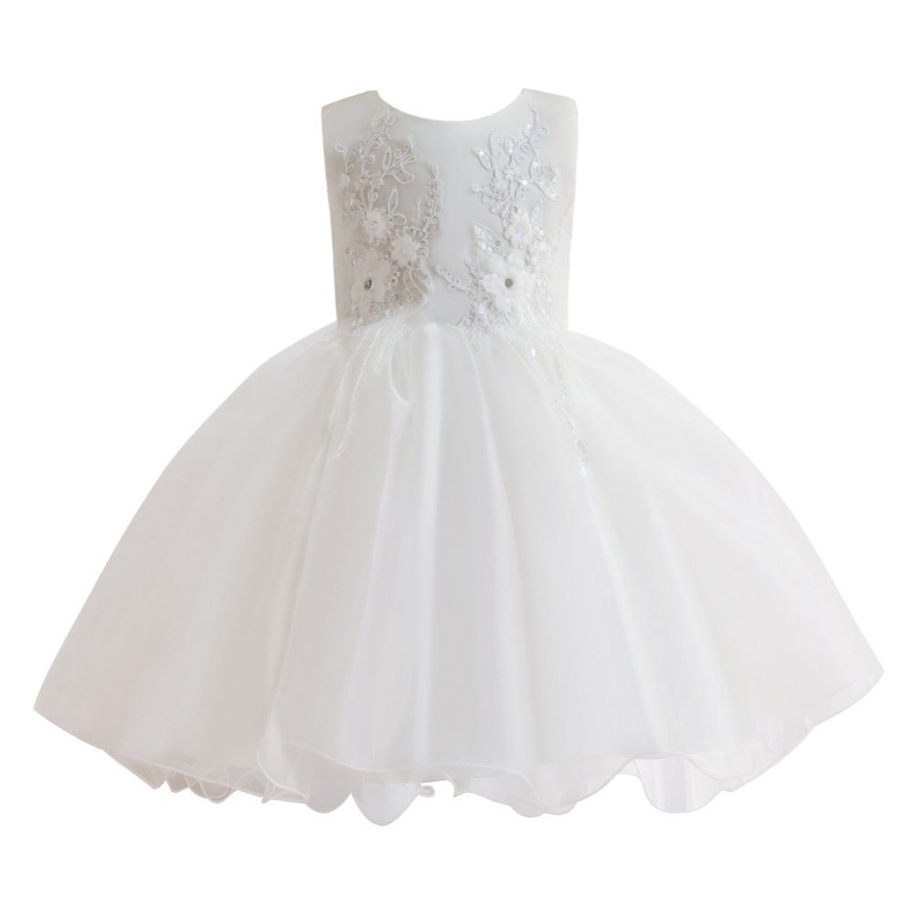 Vestido de niña, vestido blanco, con detalles de flores en la parte arriba