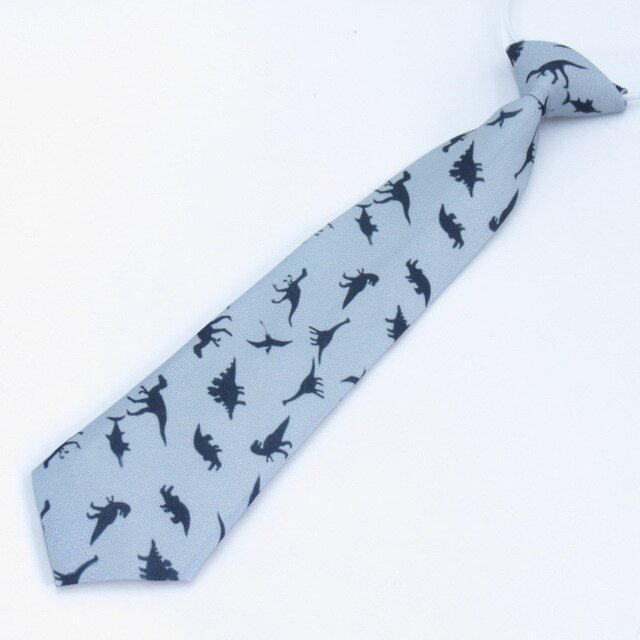 Corbata celeste con patrón de dinosaurio